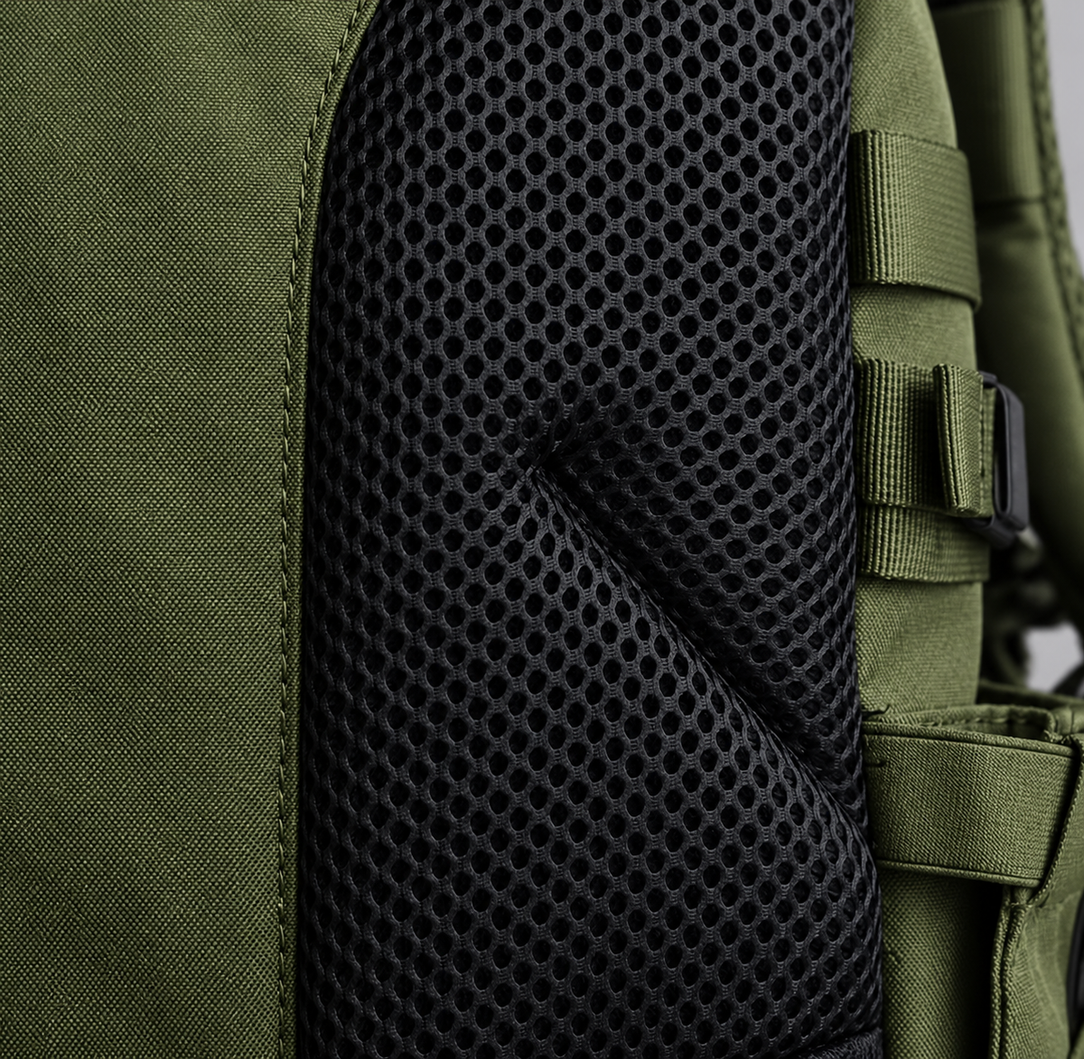 army green backpack – black breathable back mesh detail