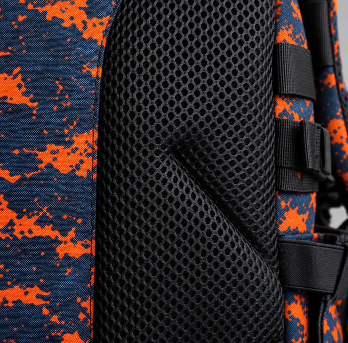 blue orange tie dye backpack – black breathable back mesh detail