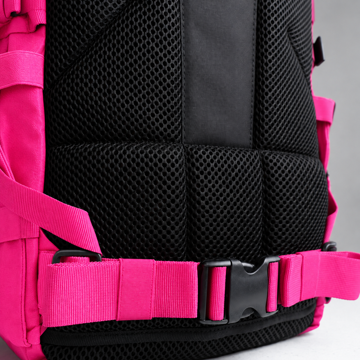 hot pink backpack – rear waist strap and black mesh detail