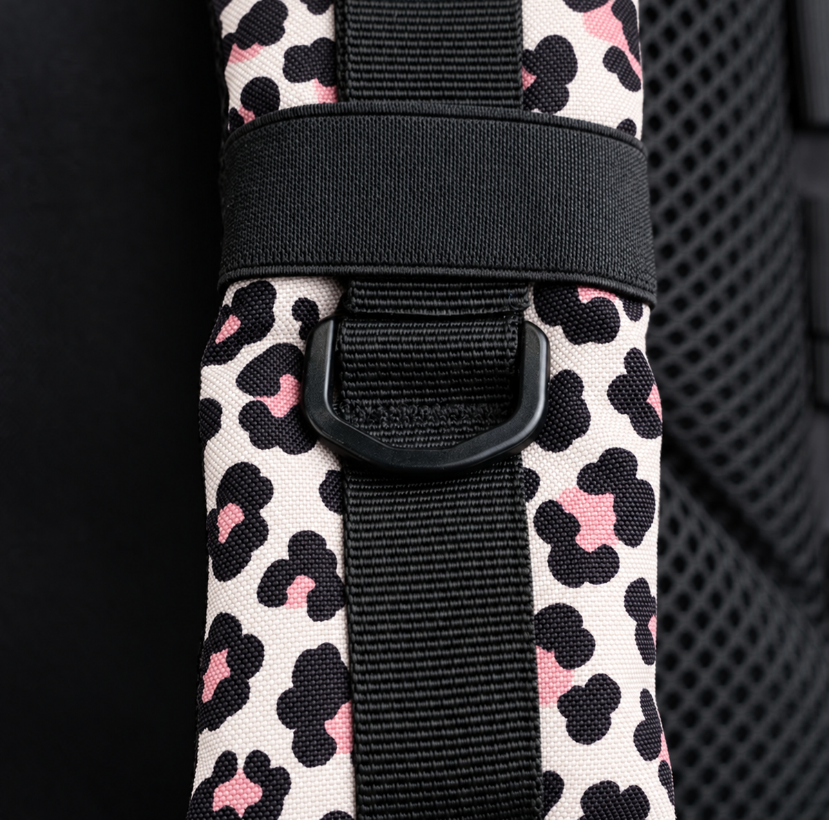 leopard backpack – shoulder strap with black fitting detail