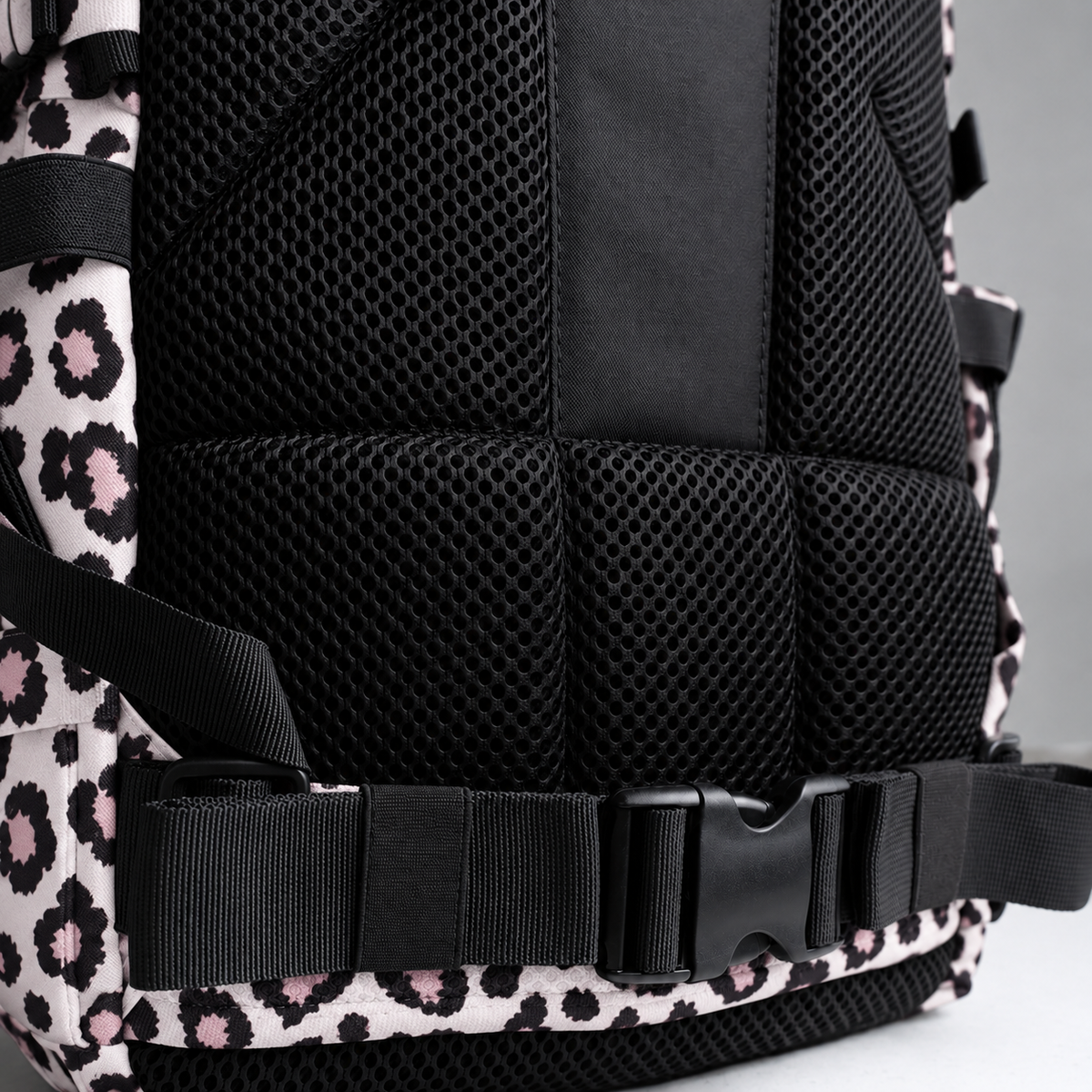 leopard 9l backpack – rear waist strap and black mesh detail