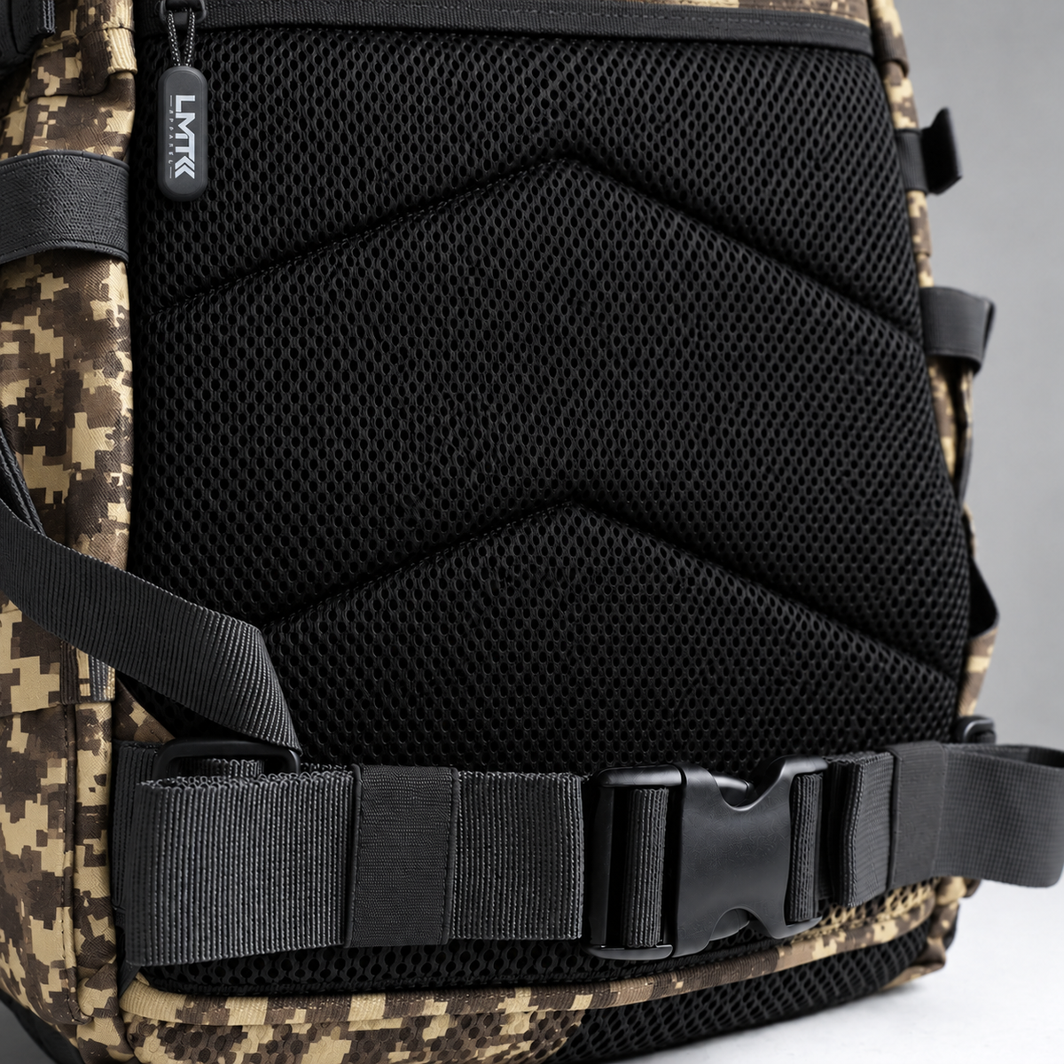 pixel camo backpack – rear waist strap and black mesh detail