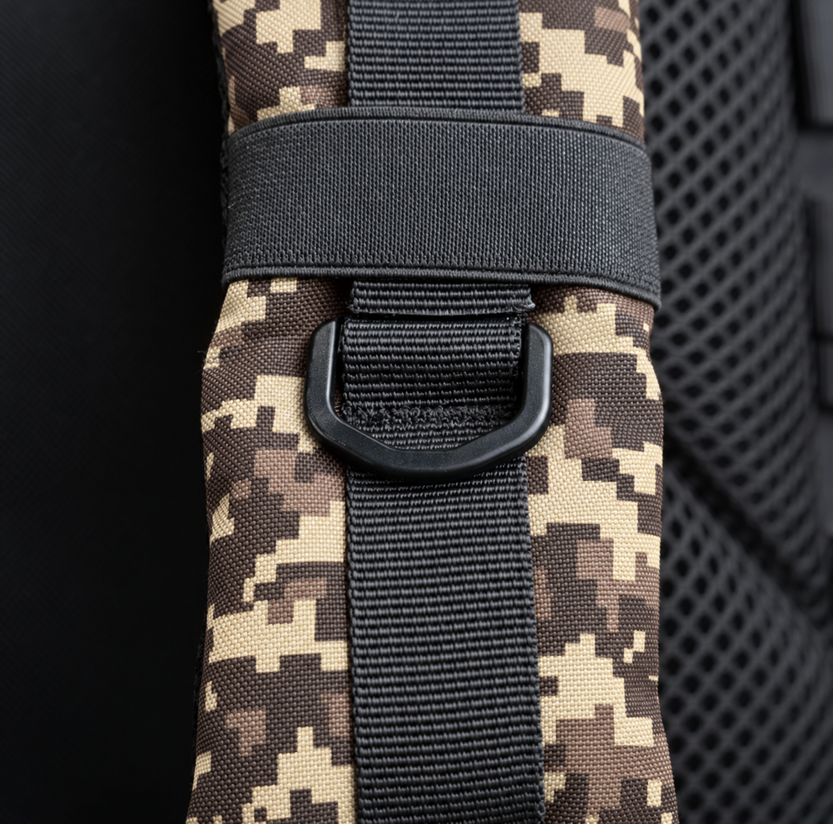 pixel camo backpack – shoulder strap with black fitting detail