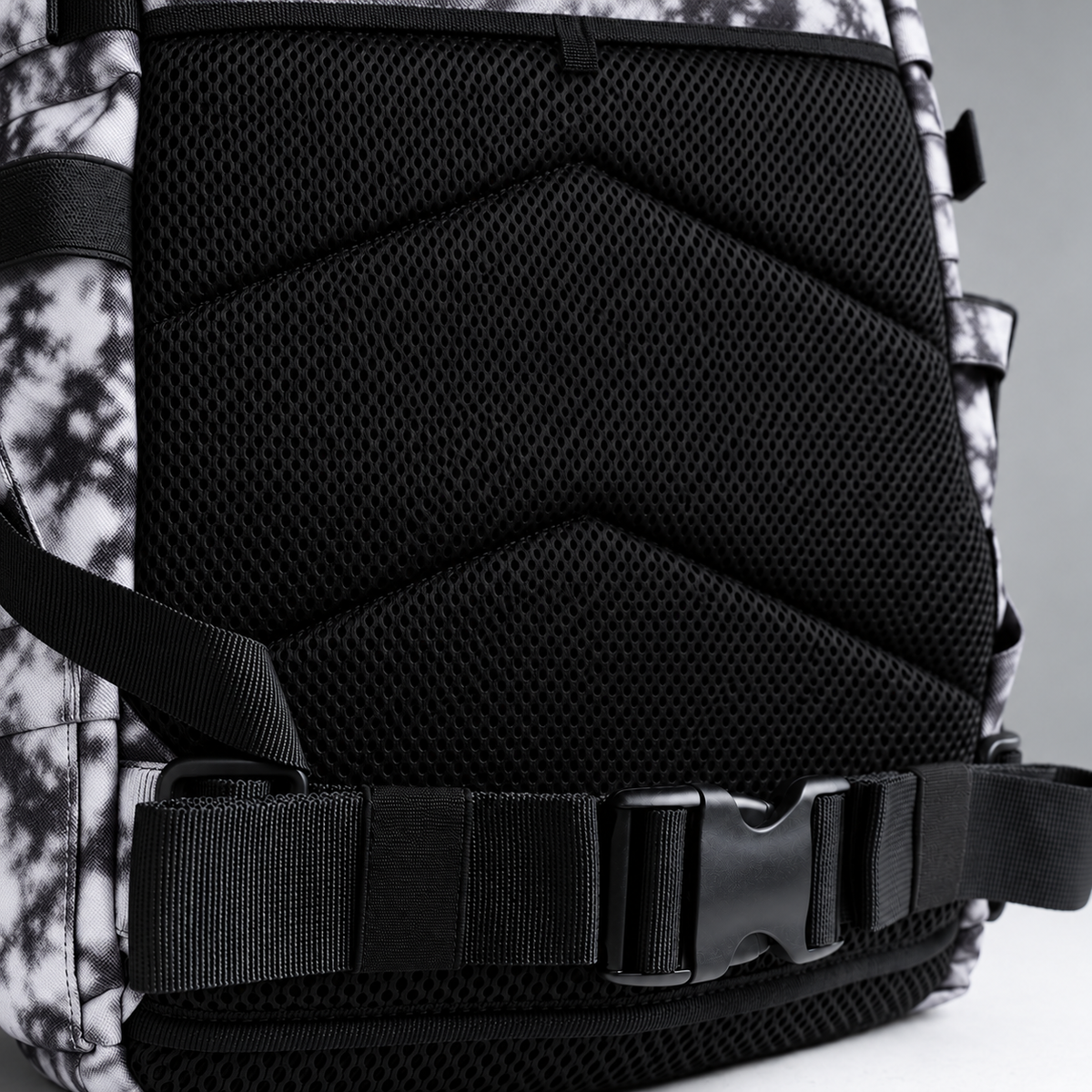 white tie dye backpack – rear waist strap and black mesh detail