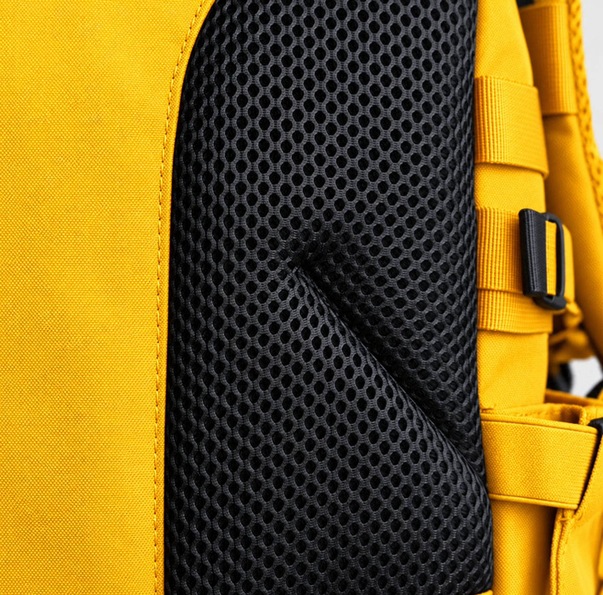 yellow backpack – black breathable back mesh detail