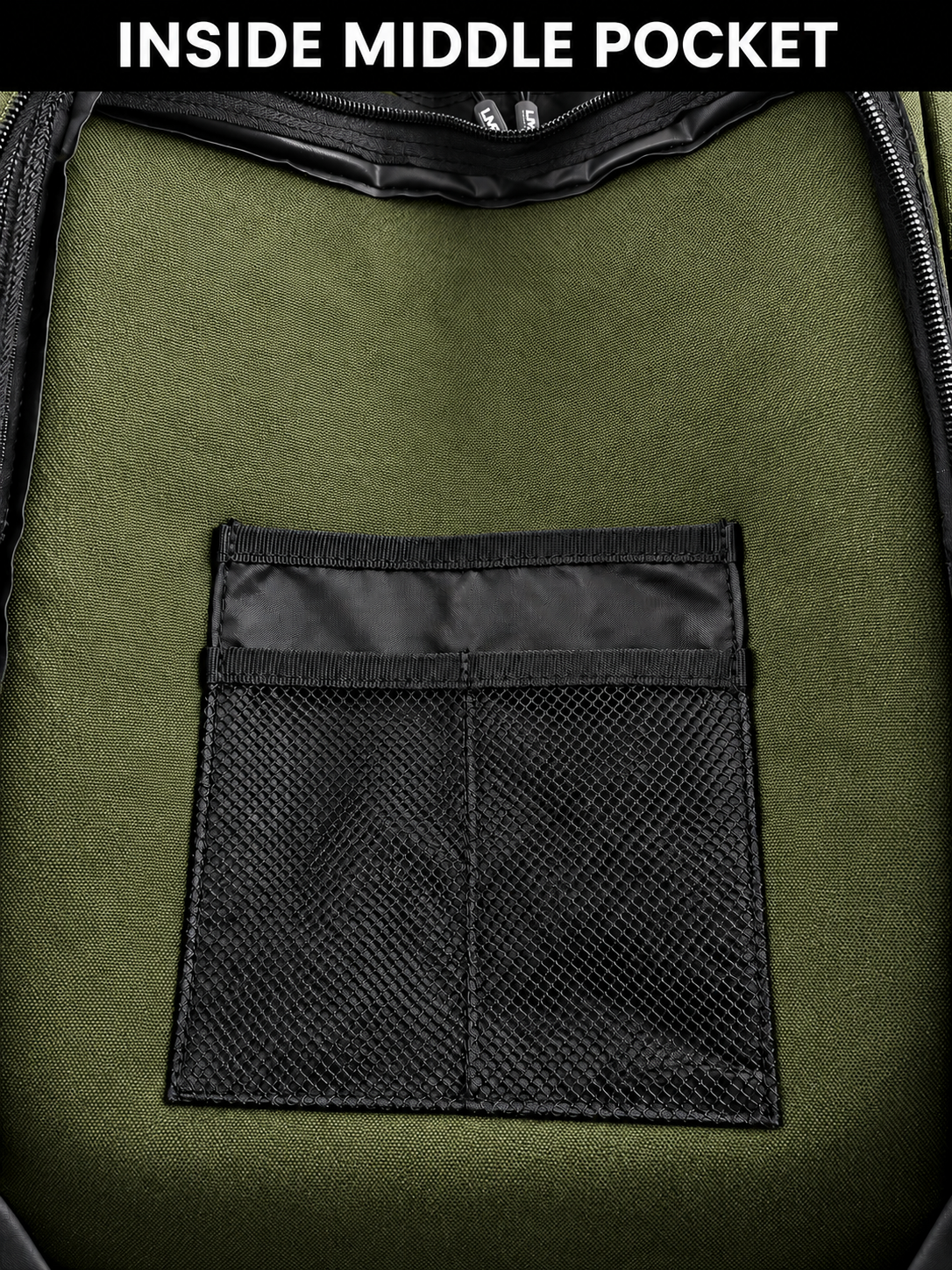 Inside middle pocket of army green backpack
