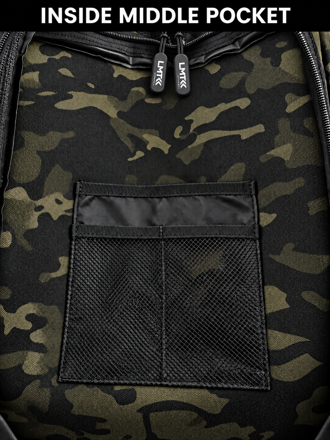 Inside middle pocket of black camo backpack