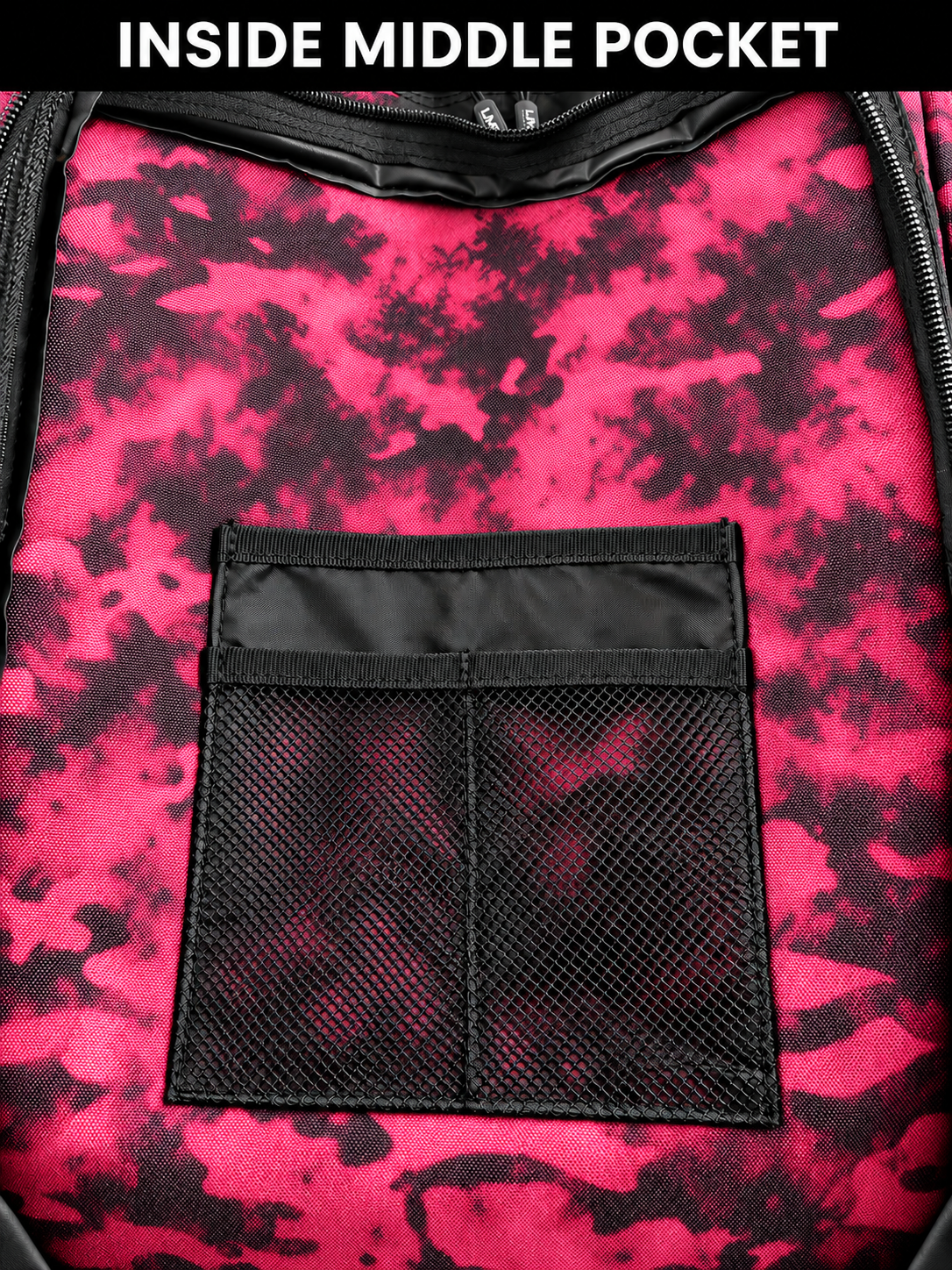 Inside middle pocket of black pink tie dye backpack