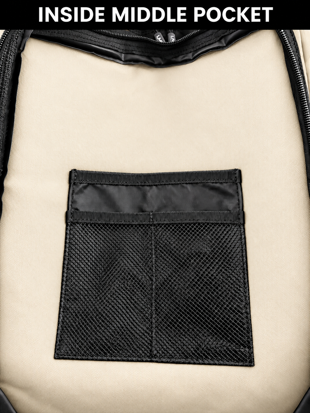 Inside middle pocket of off white backpack