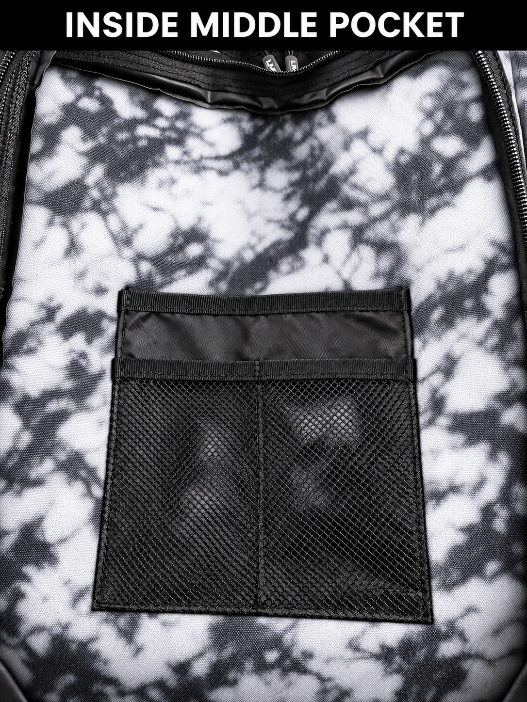Inside middle pocket of white tie dye backpack